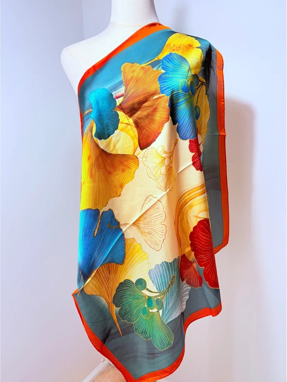 Vibrant Floral Scarf with Orange Border